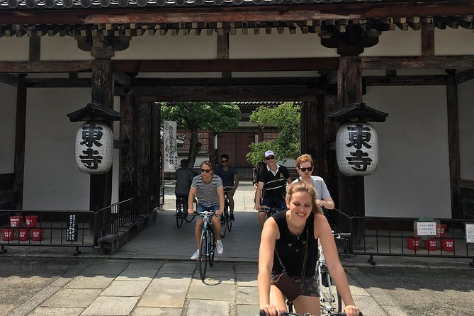 Full Day Biking Tour Exploring the Best of Kyoto - Riding past the former imperial seat: a Kyoto grandeur move