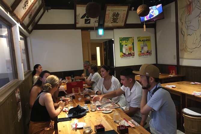 Japanese Sake Breweries Tour in Fushimi Kyoto - Fushimi Yume Hyakushu: an old storefront and sake ice cream