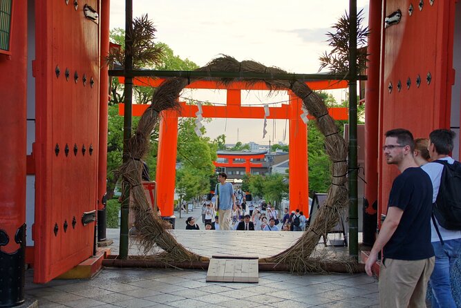Kyoto: Fushimi Inari Shrine Walking Tour - Torii gates, fox statues, and rituals on the way up