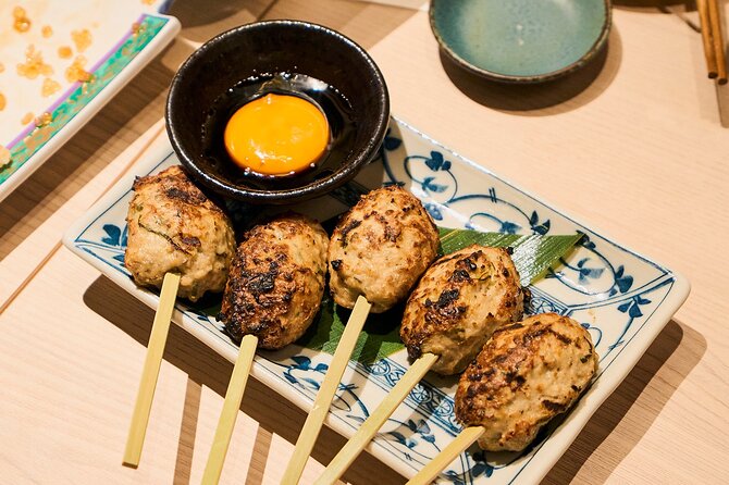Kyoto: Guided Food Tour with 12 Dishes & 3 Drinks - Sake bars and 3 drinks: local hangout energy