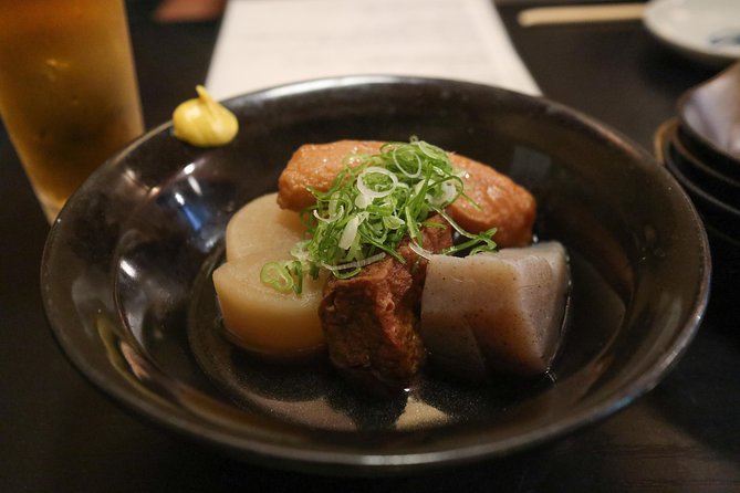 Kyoto Night Foodie Tour in Gion (9+ dishes + 6 Sake tastings) - Stop 2 in Pontocho: Eating in a Famous Night Dining Corridor