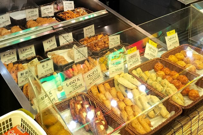 Kyoto Nishiki Market & Depachika: 2-hours Food Tour with a Local - Nishiki Tenmangu Shrine: a calm pause near the food crush