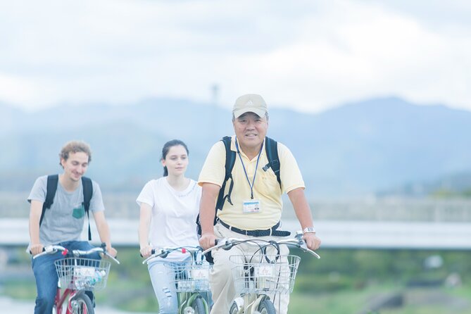 Private eBike Tour Exploring Fushimi with Torii Red Gate Ride - Cycling past a Nintendo Original Building: a quick modern Kyoto pause